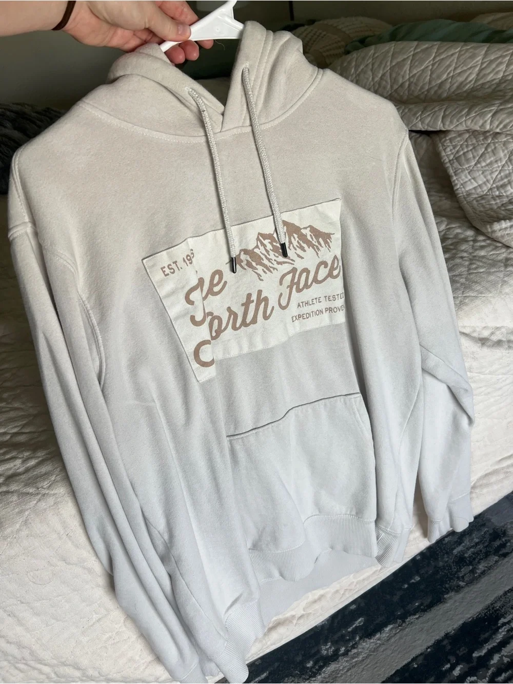 The North Face Men’s Light Gray Pullover Hoodie with Tan Logo